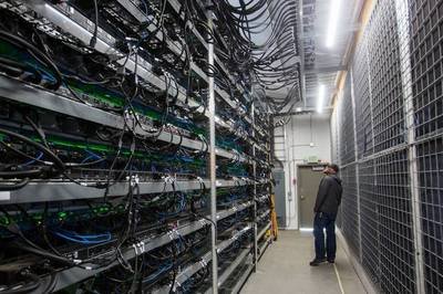 Expansive view of a mining farm with numerous rigs